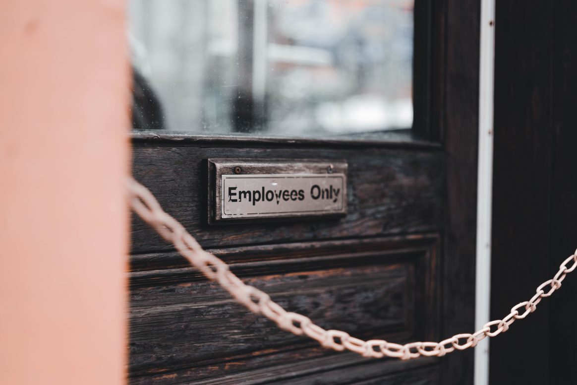 Chain across doorway with small sign that reads "Employees Only"