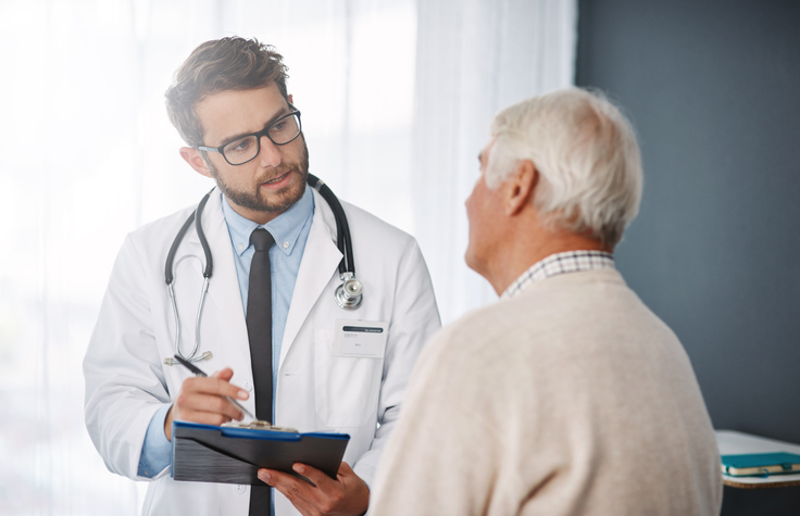 Man speaks to doctor