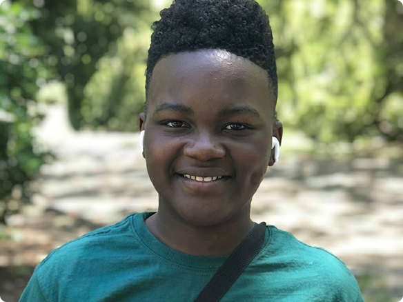 Young boy in t-shirt smiling