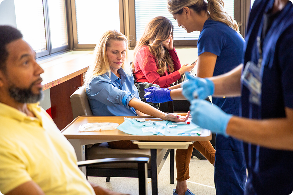 Nurses drawing patients’ blood at the lab.