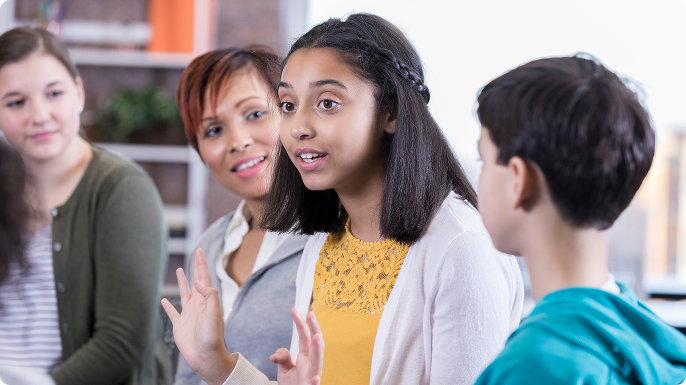 Young teens converse at support group.