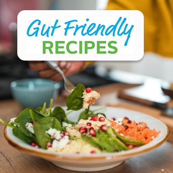 Colorful plate of fresh vegetables and grains with "Gut Friendly Recipes" text overlay.