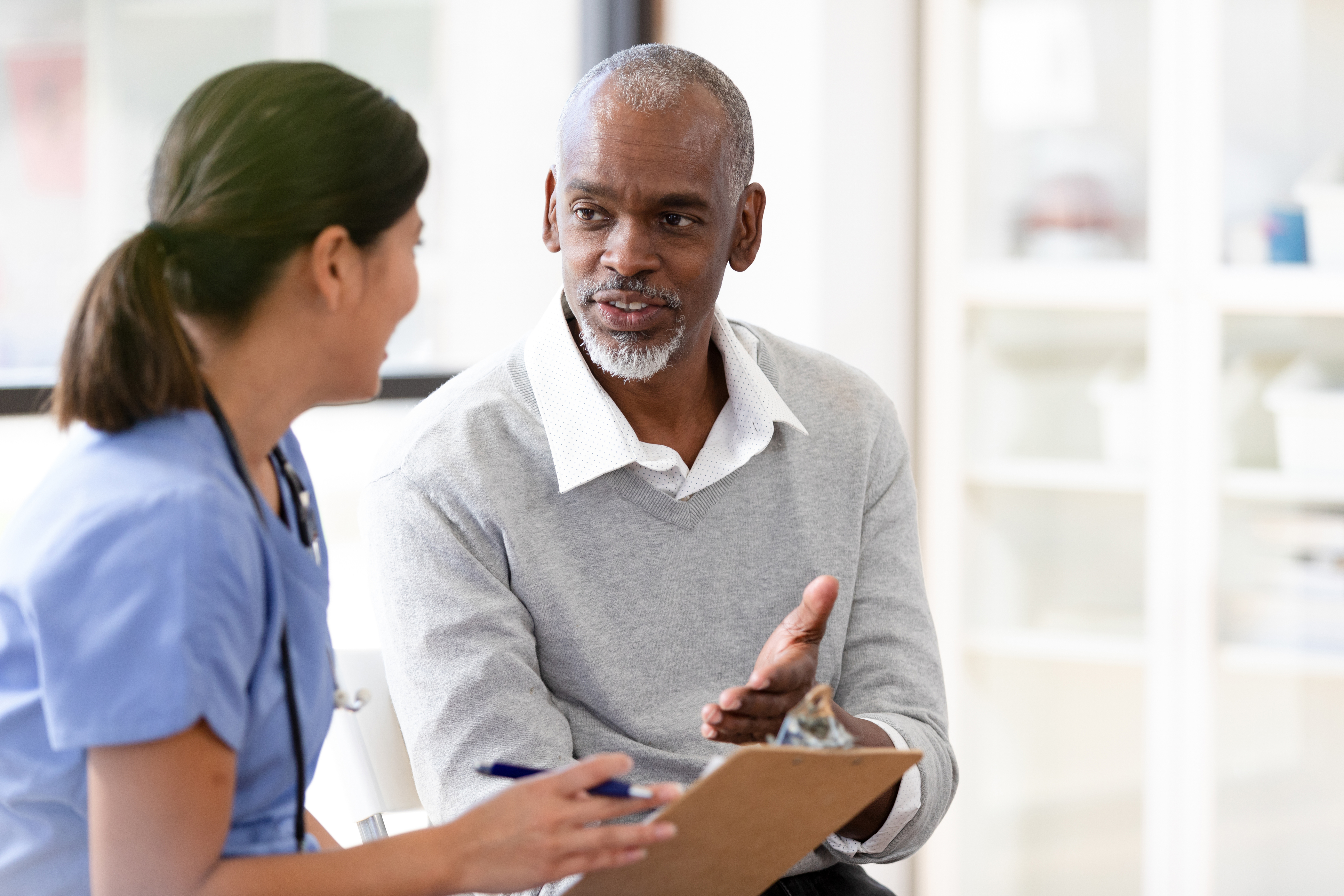 Doctor and patient discussing treatment options.