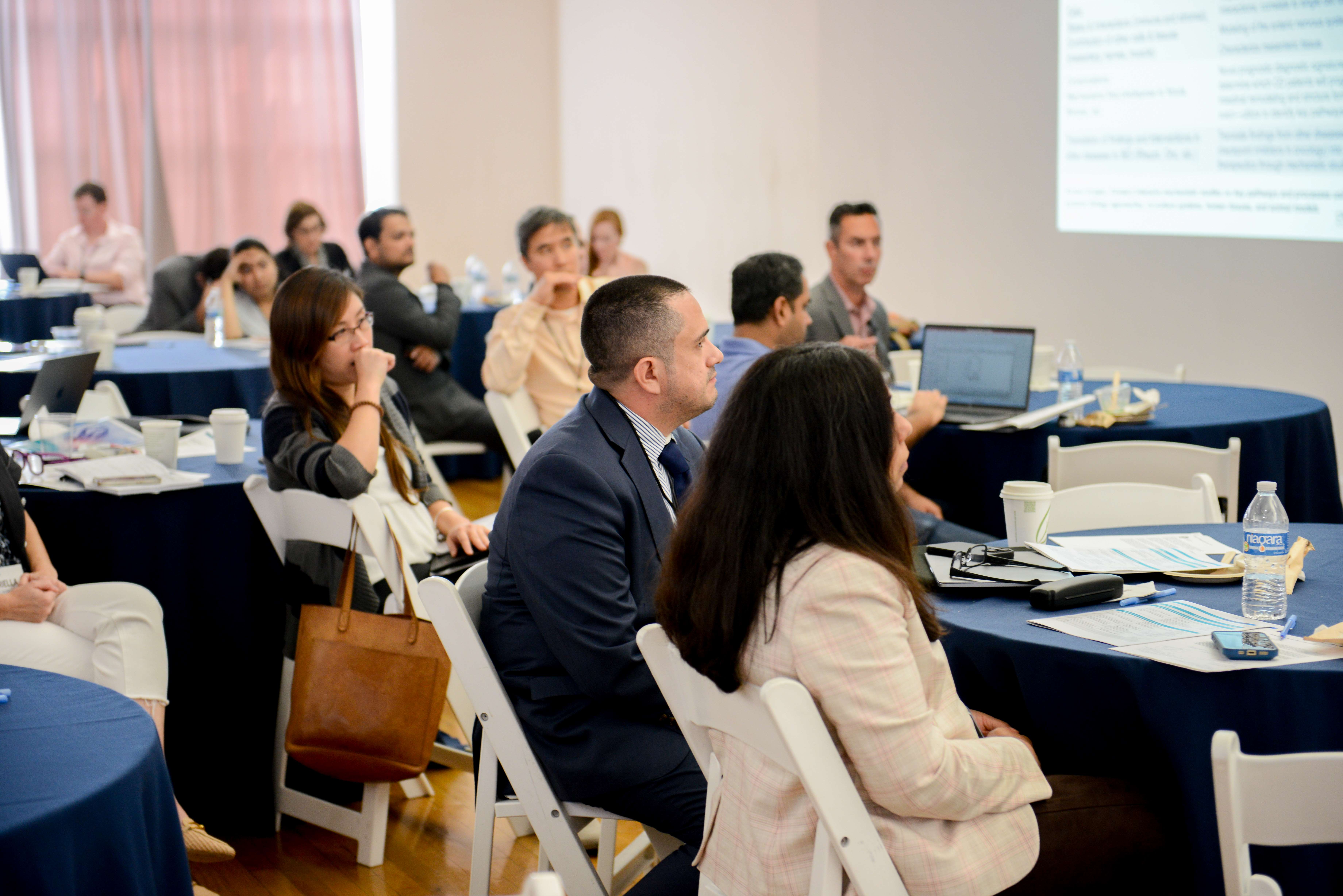 audience at research symposium