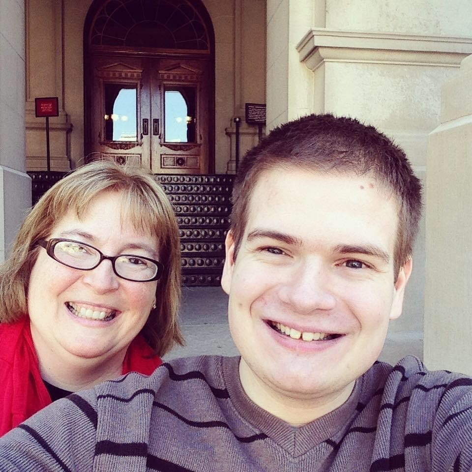 Heidi smiles with her son