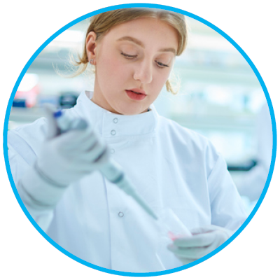 Young scientist in a lab coat uses a pipette, focused on her work in a bright laboratory. The scene conveys precision and concentration.
