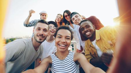 Community with IBD smiling as they care for their mental health 