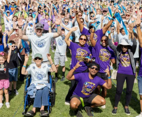 Crowd of walkers celebrating