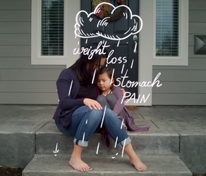 Mother and daughter outdoors, hugging and upset