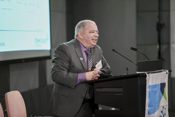 Dr. Peter Higgins addresses crowd about exciting advancements in crohns and ulcerative colitis care