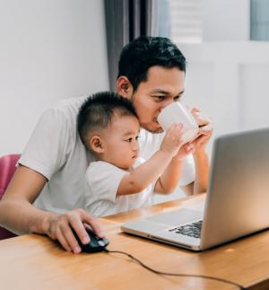 Dad and son on computer